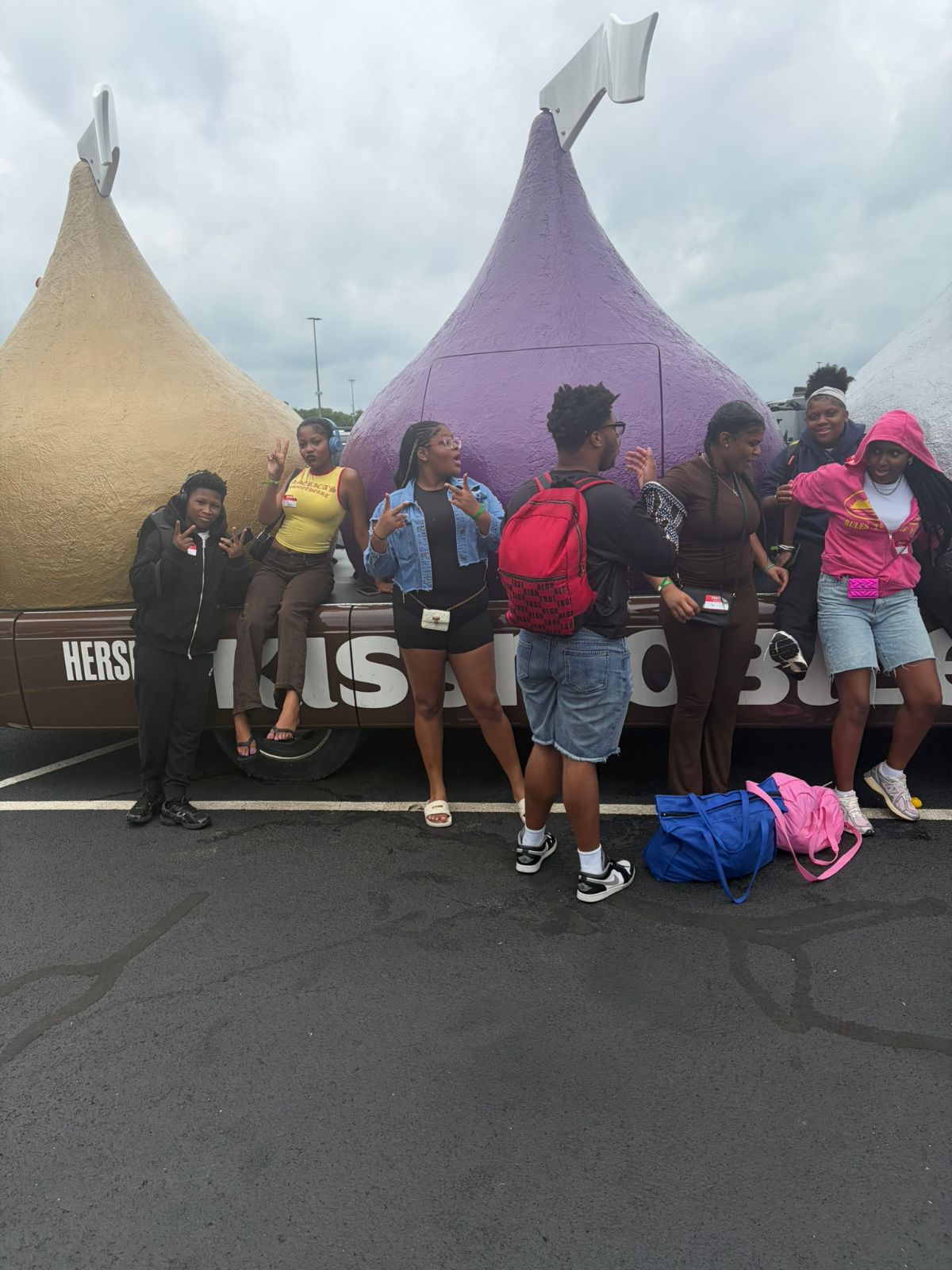 Young people from Children of the Future gathered in front of the Hershey Kiss tents at Hersheypark